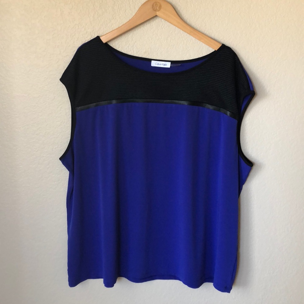 Calvin Klein blue blouse with black detailing